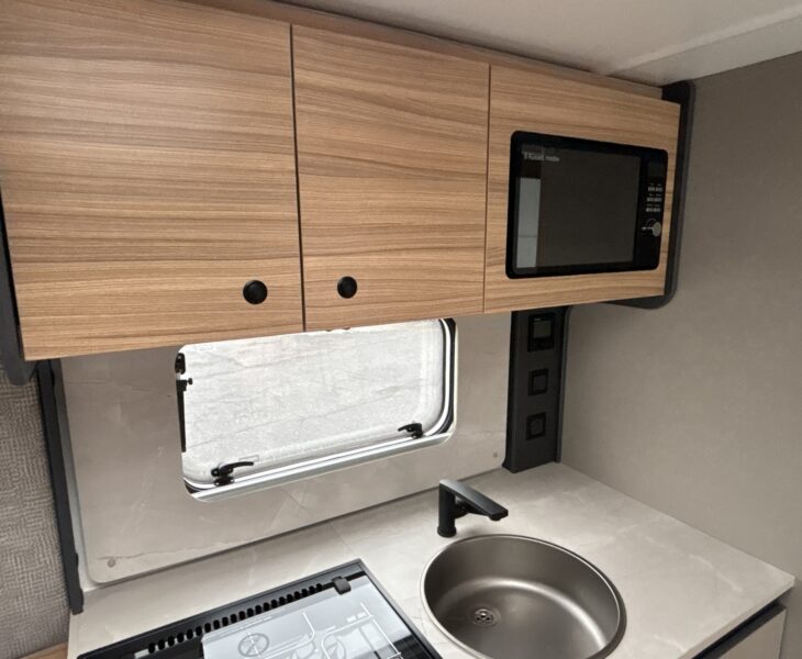 2026 Bailey Phoenix 420 Black Edition kitchen locker