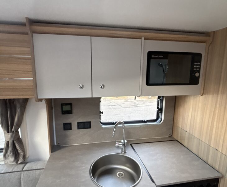 2025 Bailey Pegasus GT75 Portofino kitchen storage and microwave