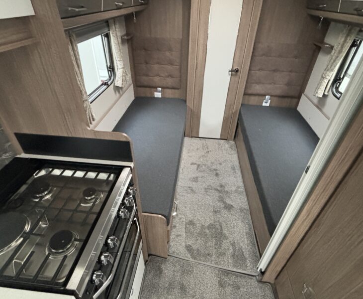 2025 Coachman VIP 565 fixed single beds